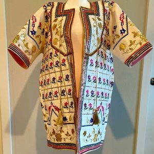 A unique elegant hand embroidered North African open front vest